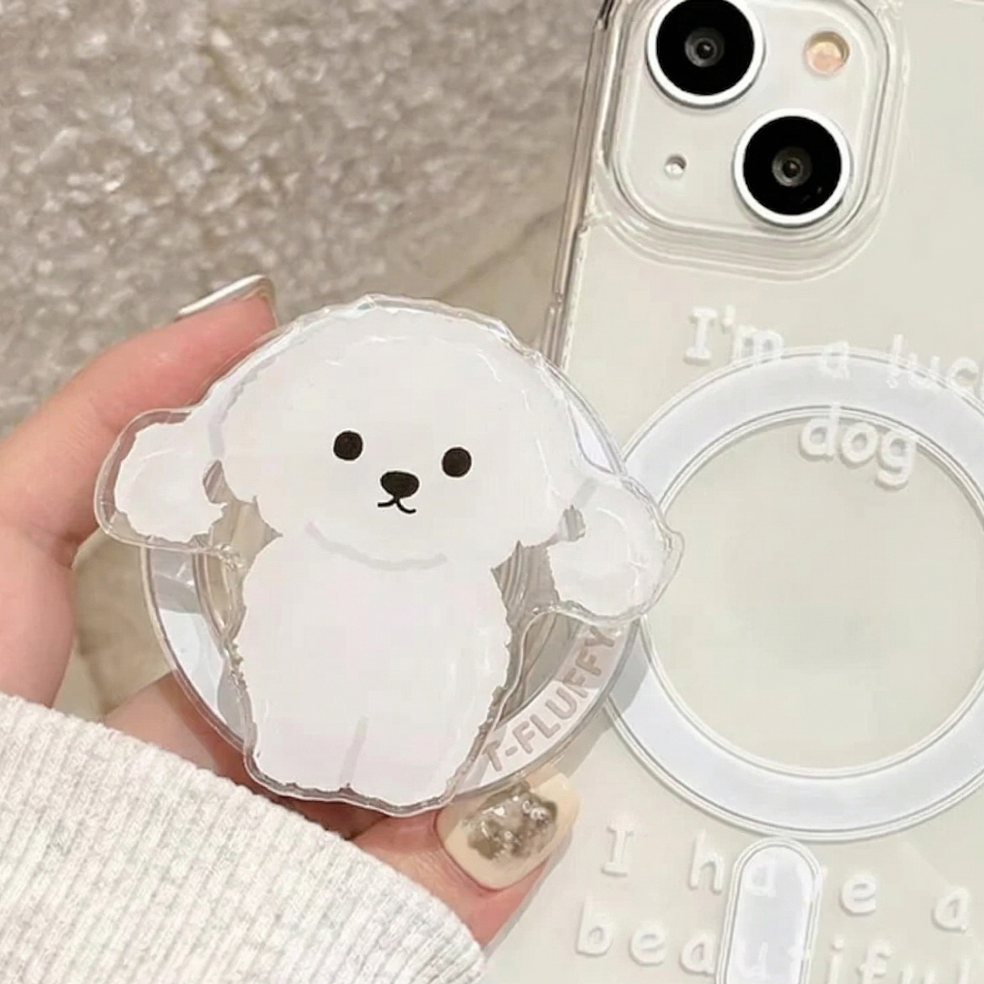 Phone case with a cute white dog design held by a hand